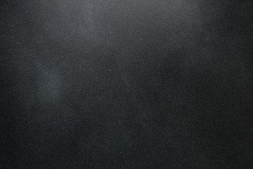 Dark cement background. Black texture wall with copyspace