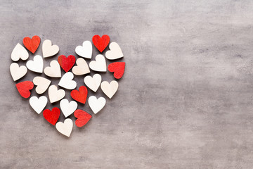 Obraz premium Happy Valentines day background. With small hearts on gray background.