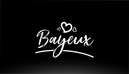 bayeux black and white city hand written text with heart logo