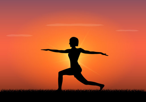 Silhouette of woman doing yoga at sunset