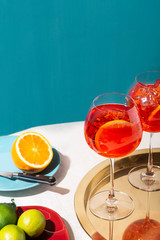 Spritz veneziano, an IBA cocktail, with Prosecco or white sparkling wine, bitter, soda, ice and a slice of orange, in a calix on a table, pop graphic style