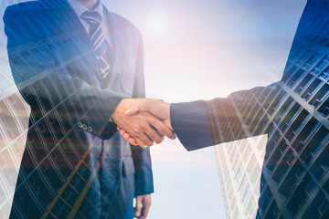 Two male executives have joined hands because of the two business cooperation agreements that have achieved success in the investment of the real estate business.
