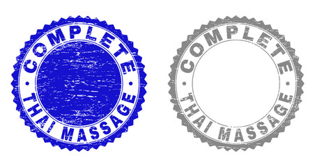 Grunge COMPLETE THAI MASSAGE stamp seals isolated on a white background. Rosette seals with grunge texture in blue and gray colors.