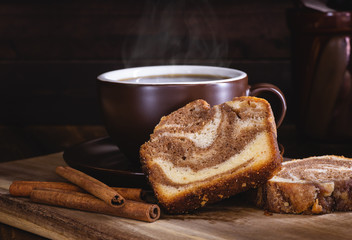 Sliced Cinnamon Swirl Sweet Bread and Cup of Coffee