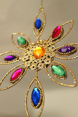 Colourful gold and jewelled hanging flower decoration