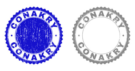 Grunge CONAKRY stamp seals isolated on a white background. Rosette seals with grunge texture in blue and gray colors. Vector rubber watermark of CONAKRY caption inside round rosette.