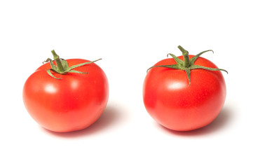 closeup of fresh tomatoes on white background