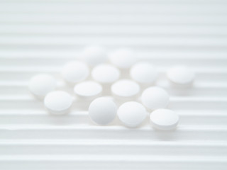 pills on black background
