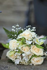 bouquet with roses on the ground