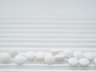 pills on black background