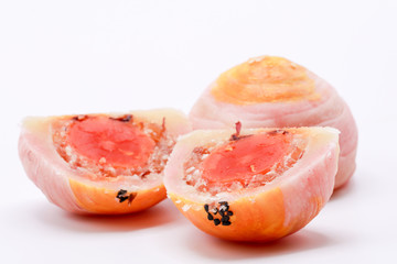 Close up Spring Roll pastry with nuts, salted eggs on isolate white background.Delicious Chinese pastry .