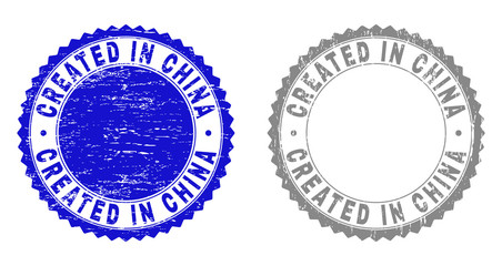 Grunge CREATED IN CHINA stamp seals isolated on a white background. Rosette seals with grunge texture in blue and grey colors.