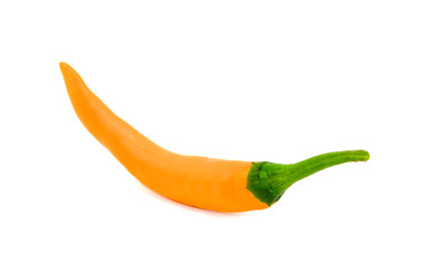 Closeup side view of one yellow chili pepper  on white background, raw food ingredient concept. Clipping path - Image.