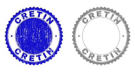 Grunge CRETIN stamp seals isolated on a white background. Rosette seals with distress texture in blue and gray colors. Vector rubber stamp imitation of CRETIN tag inside round rosette.