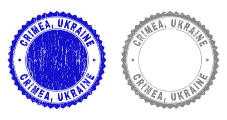 Grunge CRIMEA, UKRAINE stamp seals isolated on a white background. Rosette seals with grunge texture in blue and grey colors. Vector rubber stamp imprint of CRIMEA, UKRAINE label inside round rosette.