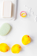 baby accessories for bath with duck on white background