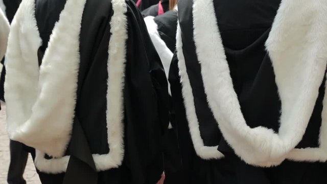 Anonymous Cambridge University graduates in gown and hood Cambridge, England