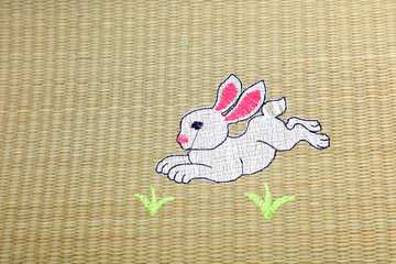 rabbit decorations on the mat