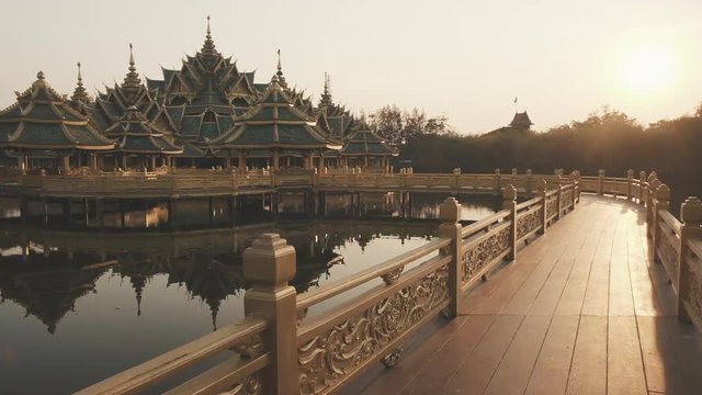 Beautiful buddhist temple " Pavilion of Enlightened " in Ancient City, Bangkok during the sunset
