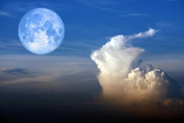 super snow moon back white heap cloud on blue sky