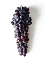 bunch of grapes in basket on white background