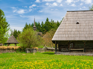 Fototapeta na wymiar Scenic spring rural landscape with traditional maramures wooden architecture, Maramures, Romania