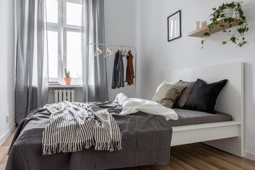 Bedroom with clothes rack