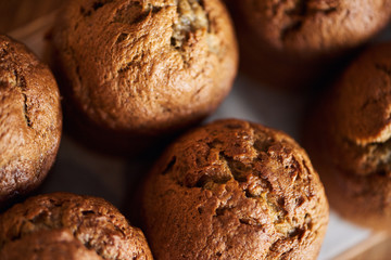 Closeup of freshly baked muffins sitting on a table