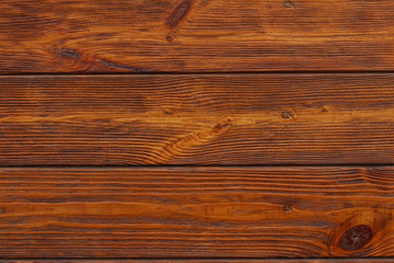 The wall of the club is decorated with wood and stone.