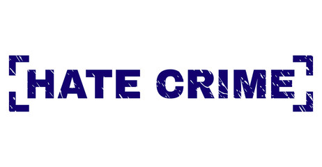 HATE CRIME text seal print with corroded effect. Text tag is placed inside corners. Blue vector rubber print of HATE CRIME with corroded texture.