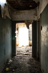 Fototapeta premium Abandoned building interior. Ghost house. Partially ruined house.