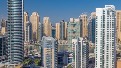 Naklejka premium Dubai Marina skyscrapers aerial top view at morning from JLT in Dubai timelapse, UAE.