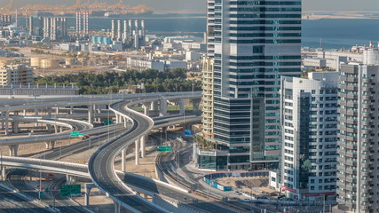 Aerial view of a sheikh zayed road intersection in a big city timelapse.