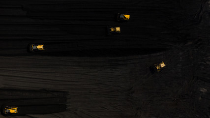 Coal storage and bulldozer, Aerial view coal mining industry.