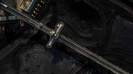 Coal storage and bulldozer, Aerial view coal mining industry.