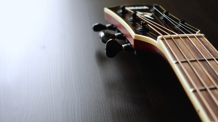 guitar headstock with tuning pegs . closeup