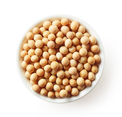 Bowl of soybeans isolated on white, from above