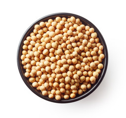 Bowl of soybeans isolated on white, from above