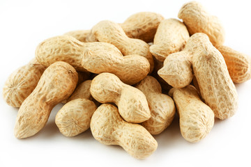 Peanuts. Two peeled nuts isolated on white background. Peanut macro.