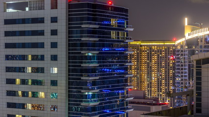 Fototapeta na wymiar Dubai marina skyscrapers aerial skyline night timelapse.