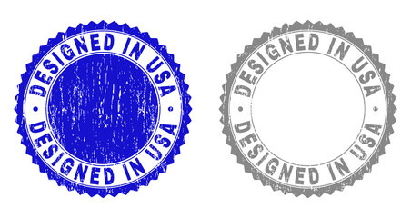 Grunge DESIGNED IN USA stamp seals isolated on a white background. Rosette seals with distress texture in blue and gray colors.
