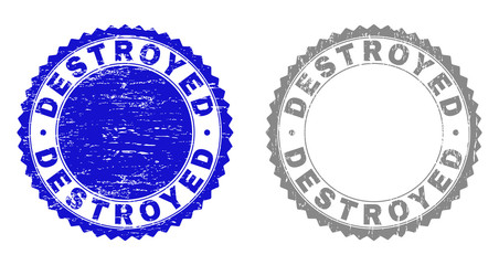 Grunge DESTROYED stamp seals isolated on a white background. Rosette seals with grunge texture in blue and grey colors. Vector rubber stamp imprint of DESTROYED label inside round rosette.