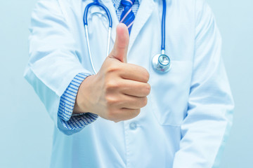 Doctor hand giving thumbs up on white background