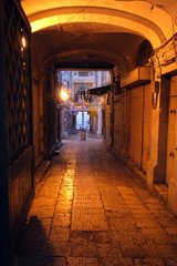Fototapeta na wymiar The narrow street in the Old City of Jerusalem