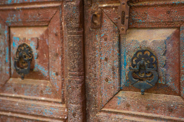 ancient aged doors with  knockers