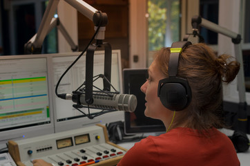 female dj in studio radio station
