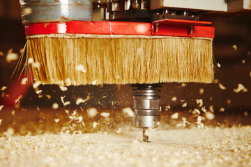 Cnc machine working, cutting wood. Woodwork industry.
