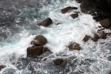 Waves breaking on the rocks
