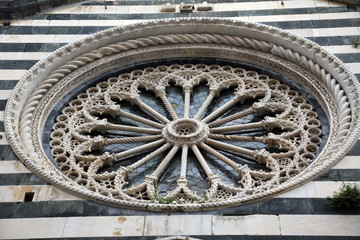 Fototapeta na wymiar Rosette at the Church of St. John the Baptist in Monterosso, Liguria, Italy