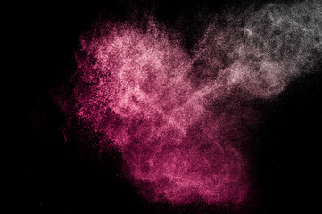 red powder effect splash for makeup artist or graphic design in black background